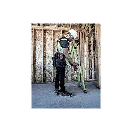 A picture of a carpenter using Little Giant MightyLite Step Ladder